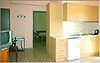 Apartment - Bedroom door and kitchenette