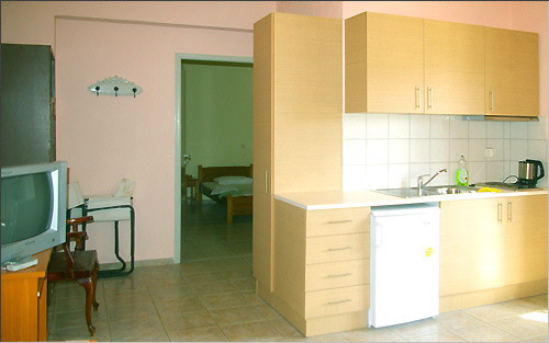 Apartment - Bedroom door and kitchenette